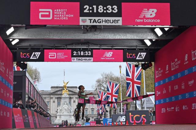 netherlands sifan hassan breaks the tape to win the womens race at the finish of the 2023 london marathon in central london on april 23, 2023
