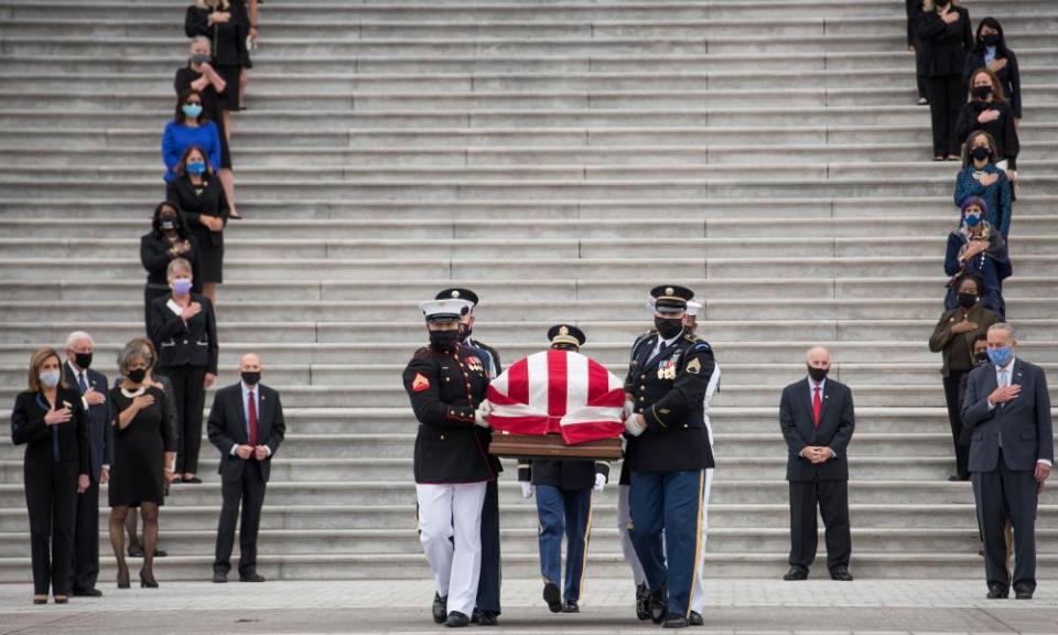 Ruth Bader Ginsburg’s casket departs the US Capitol in Washington DC Friday.