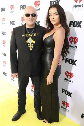 <p>Kevin Mazur/Getty</p> David Draiman and Sarah Uli