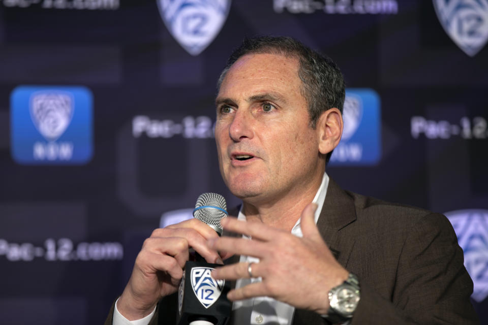 FILE - In this Oct. 7, 2019, file photo, Pac-12 Commissioner Larry Scott speaks to reporters during the Pac-12 Conference women's NCAA college basketball media day in San Francisco. The Pac-12 university presidents and chancellors will meet Friday, Sept. 17, 2020, and be presented options for staging a fall football season, but Commissioner Larry Scott says a vote by the the CEO Group is not expected. (AP Photo/D. Ross Cameron, File)