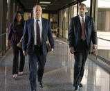 Former Minneapolis FBI agent Terry Albury and his attorney, Joshua Dratel, left, walk out of the Federal Courthouse in St. Paul Thursday, Oct. 18, 2018 after Albury was sentenced to four years in prison for leaking classified defense documents to a reporter. (Shari L. Gross/Star Tribune via AP)