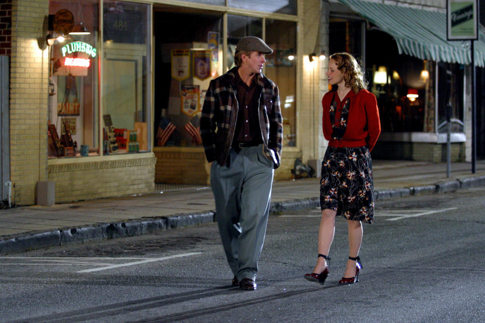 Noah and Allie walking down a road