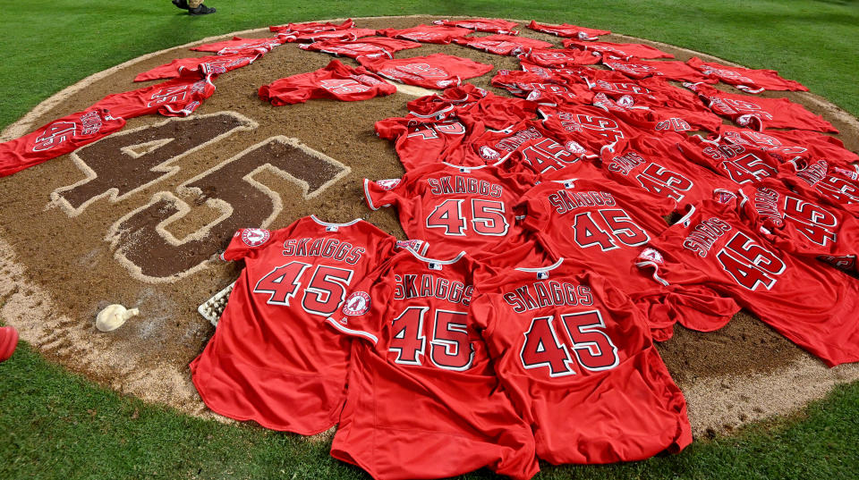 ANAHEIM, CA - JULY 12: Los Angeles Angels placed their jerseys on the mound in honor of Tyler Skaggs as the Los Angeles Angels throw a combined no-hitter and defat the Seattle Mariners 13-0 during a MLB baseball game at Anaheim Stadium on Friday, July 12, 2019 in Anaheim, California. (Photo by Keith Birmingham/MediaNews Group/Pasadena Star-News via Getty Images)