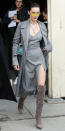 <p>Bella arrived at Chanel's PFW show in a slate gray ensemble comprised of a plunging pinstriped maxidress, long wool coat, over-the-knee boots (try a similar look <a rel="nofollow noopener" href="http://www.anrdoezrs.net/links/7799179/type/dlg/sid/ISBellaHSSBootsIJMarch/http://www.stuartweitzman.com/products/highland/?DepartmentId=856&DepartmentGroupId=1&ColMatID=16146" target="_blank" data-ylk="slk:here;elm:context_link;itc:0;sec:content-canvas" class="link ">here</a>), and yellow-tinted aviator shades. She accessorized with a silver cross pendant (try a similar look <a rel="nofollow noopener" href="http://click.linksynergy.com/fs-bin/click?id=93xLBvPhAeE&subid=0&offerid=390098.1&type=10&tmpid=8156&RD_PARM1=http%253A%252F%252Fshop.nordstrom.com%252Fs%252Fkonstantino-penelope-cross-pendant%252F4430686%253Fcm_mmc%253Doverture-_-polyvore_cpc-_-Women%25253AJewelry%25253ANecklace-_-5222789%2526polyvore_device%253Ddesktop%2526polyvore_group%253DNecklace%2526rkg_id%253Dh-c9c59936e84016c6f69d1aca41b00d57_t-1488905022&u1=ISBellaHSSCrossIJMarch" target="_blank" data-ylk="slk:here;elm:context_link;itc:0;sec:content-canvas" class="link ">here</a>) and chain-link choker.</p>