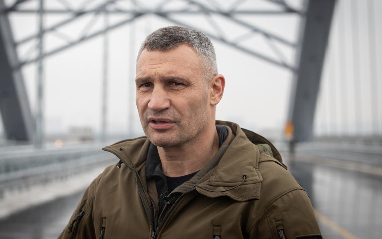 Mayor of Kiev Vitali Klitschko speaks to journalists during the opening ceremony of the Podilsko-Voskresenskyi Bridge