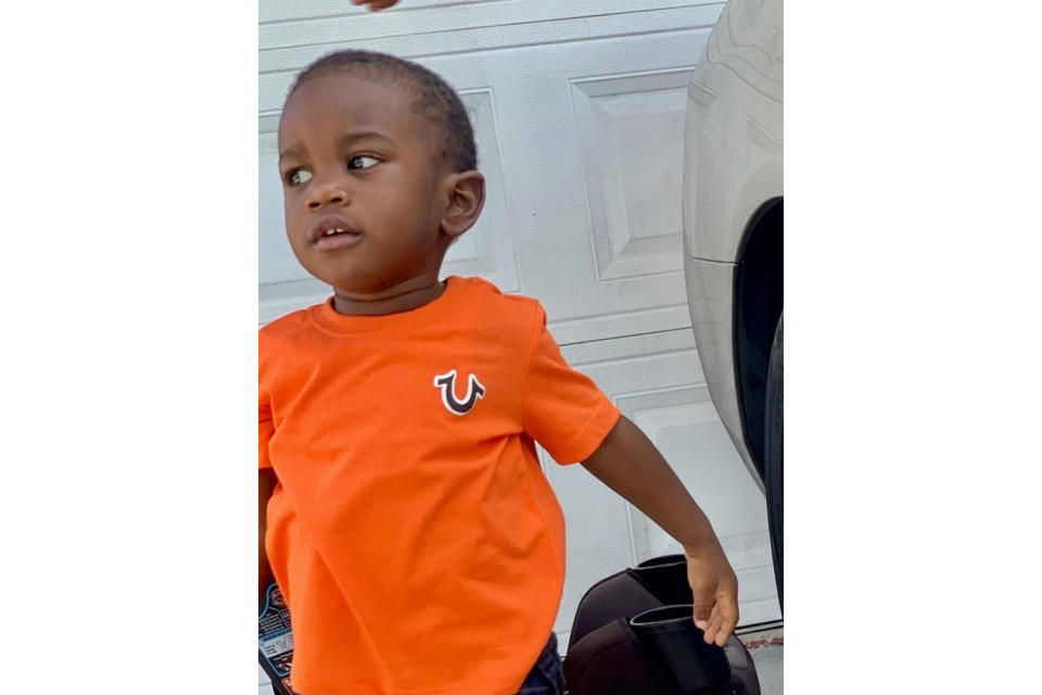 This photo provided by the St. Petersburg, Fla., Police Department shows 2-year-old Taylen Mosley, who is missing. Searchers combed the area around a Florida apartment complex on Friday, March 31, 2023, for the missing 2-year-old boy whose mother was found slain in their apartment, police said. St. Petersburg Police Chief Anthony Holloway said the boy's father, 21-year-old Thomas Mosley, is considered a “person of interest” in the killing of the mother, 20-year-old Pashun Jeffery. (St. Petersburg Police Department via AP)