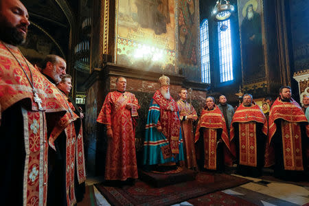 Patriarch Filaret, head of the Ukrainian Orthodox Church of the Kiev Patriarchate, conducts a service at the Volodymysky Cathedral in Kiev, Ukraine October 11, 2018. REUTERS/Valentyn Ogirenko