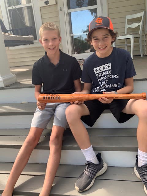 Tommy gifted the bat to his friend, Walker, whose birthday happened to take place during the storm. (Photo: Amanda Rhomberg)