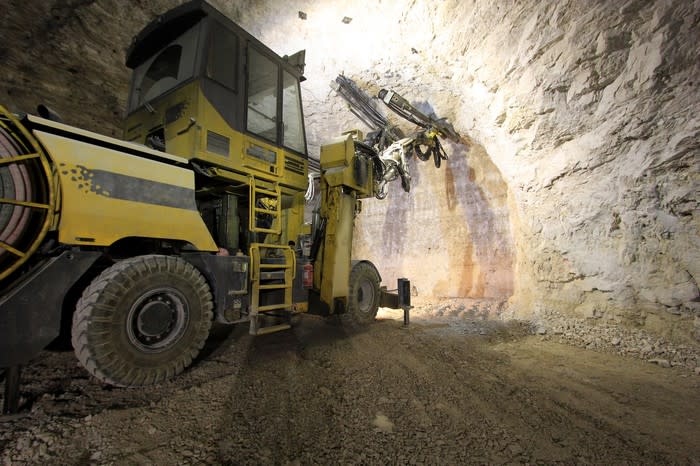 An underground excavator at work in a precious-metal mine.