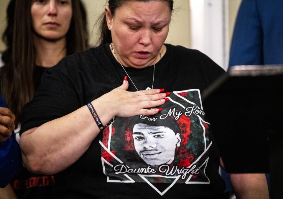 <div class="inline-image__caption"><p>Katie Bryant grasps a necklace containing the ashes of her son, Daunte Wright.</p></div> <div class="inline-image__credit">Stephen Maturen/Getty</div>