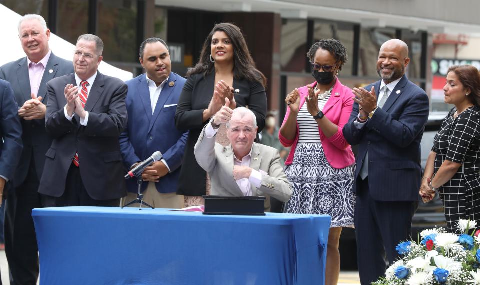 Gov. Phil Murphy signs S3691 in Union City Aug. 4, 2021. The bill ends the eviction moratorium for higher income families on Aug. 31, and on Dec. 31 for lower income families 