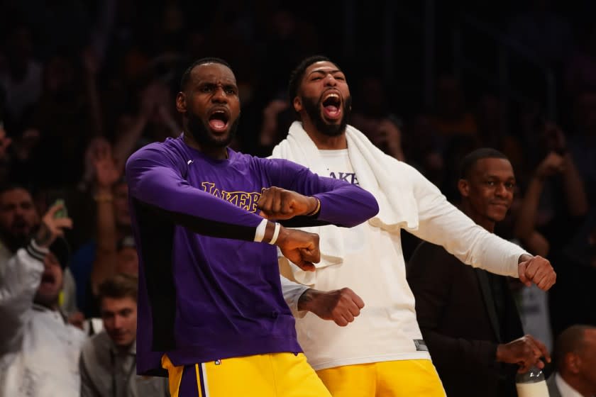 Kent Nishimura  Los Angeles Times LAKERS teammates LeBron James and Anthony Davis had plenty to cheer for during their team's 120-91 rout of Memphis.