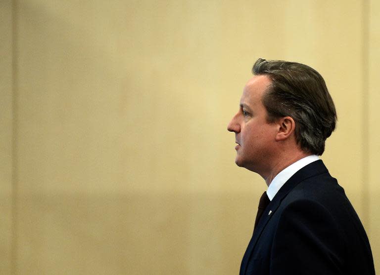 Prime Minister David Cameron leaves the fourth European Union eastern Partnership Summit in Riga, on May 22, 2015 as Latvia holds the rotating presidency of the EU Council