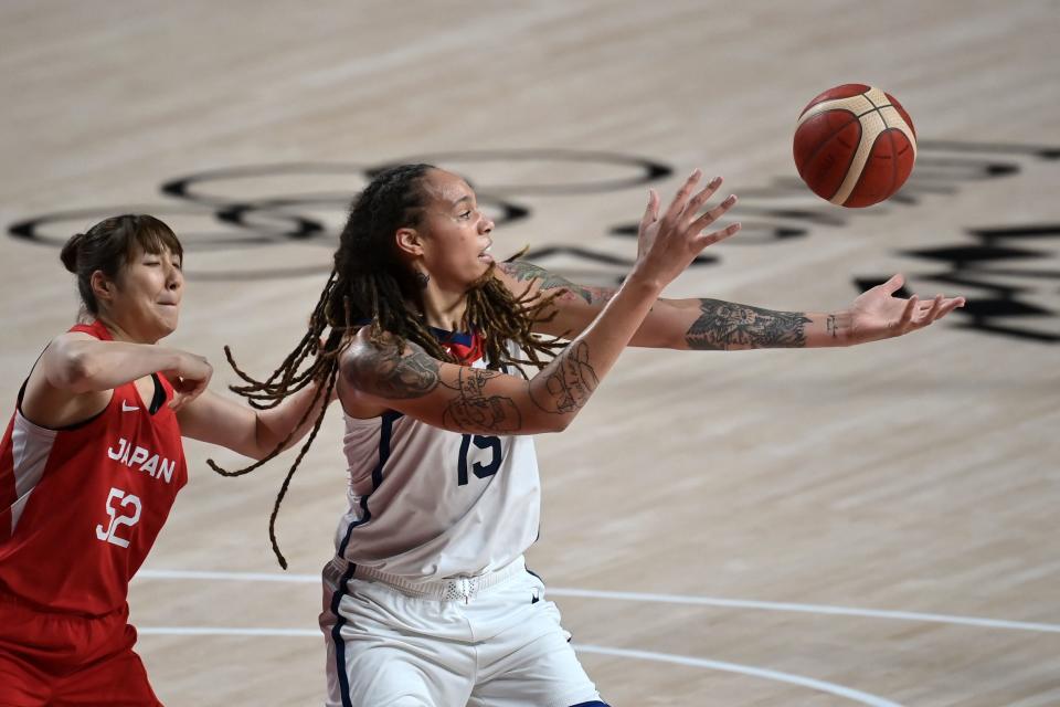 Japan's Yuki Miyazawa (L) fights for the ball with USA's Brittney Griner in the women's preliminary round group B basketball match between Japan and USA during the Tokyo 2020 Olympic Games at the Saitama Super Arena in Saitama on July 30, 2021. (Photo by Aris MESSINIS / AFP) (Photo by ARIS MESSINIS/AFP via Getty Images)