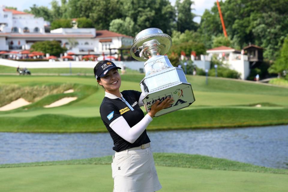 South Korea’s In Gee Chun poses with the trophy after winning the KPMG Women’s PGA Championship at Congressional Country Club (Nick Wass/AP) (AP)