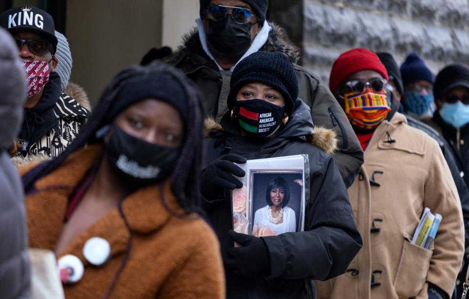 People wait on line to attend a public viewing for Cicely Tyson  at the Abyssinian Baptist Church in the Harlem neighborhood of New York,  Monday, Feb. 15, 2021.