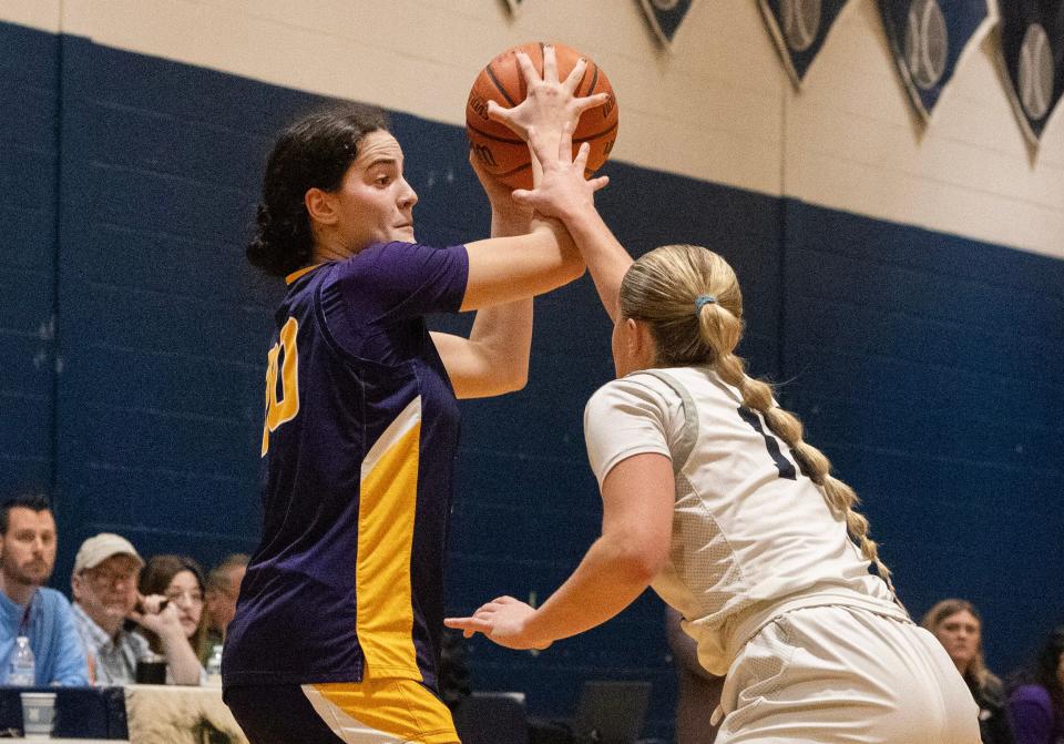 St. Rose Brooke Missry looks to pass in during first half action. St. Rose Girls Basketball vs Manasquan SCT Quarterfinal game in Middletown, NJ on February, 10 2024