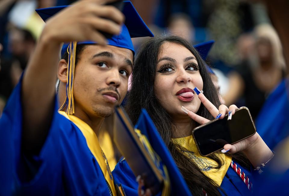 Class of 2024 Valley High School graduates took photos together after receiving their diplomas on Friday in the Valley High School gymnasium. May 24, 2024