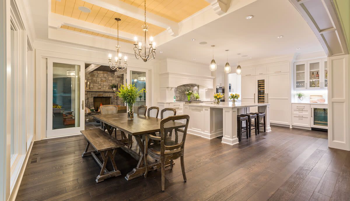 A large dining room with dining table and chairs