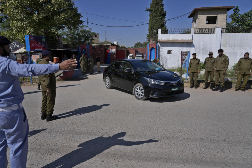 A car carrying special court judge Abul Hasnat Zulqarnain leaves after hearing of the Cipher case against Pakistan's former Prime Minister Imran Khan, at the Adiyala prison, in Rawalpindi, Pakistan, Monday, Oct. 23, 2023. A Pakistani court on Monday indicted Khan on charges of revealing official secrets after his 2022 ouster from office in another slap to the former prime minister who will likely be unable to run in the upcoming parliamentary elections in late January. (AP Photo/Anjum Naveed)