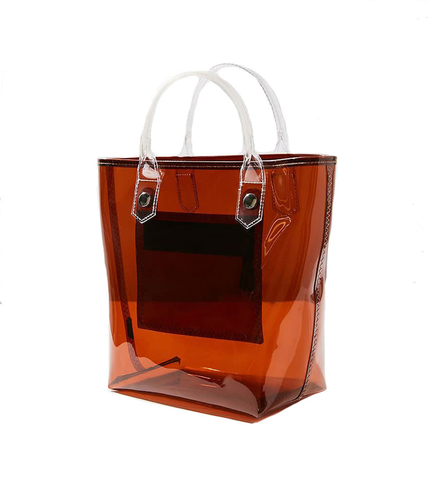 <p>Clear Mini Tote Bag, $24, <a rel="nofollow noopener" href="https://www.urbanoutfitters.com/shop/clear-mini-tote-bag?category=bags-wallets-for-women&color=020&quantity=1&size=ONE%20SIZE&type=REGULAR" target="_blank" data-ylk="slk:urbanoutfitters.com;elm:context_link;itc:0;sec:content-canvas" class="link ">urbanoutfitters.com</a> </p>