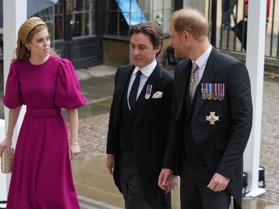 Princess Beatrice and Husband Edoardo Mapelli Mozzi along with Prince Harry, Duke of Sussex arrive ahead of the Coronation of King Charles III and Queen Camilla on May 6, 2023 in London, England.  / Credit: Unknown / Getty Images