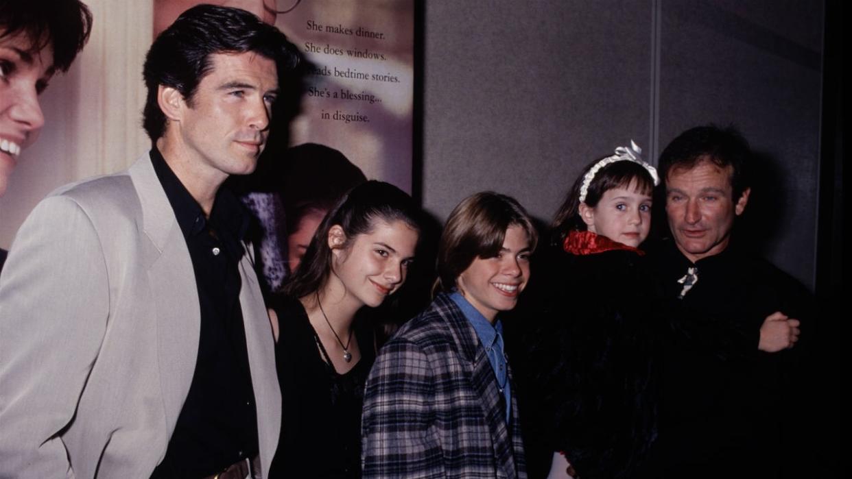 Pierce Brosnan, the Hillard children and Robin Williams (Credit: Life Picture Collection/Entertainment Tonight)