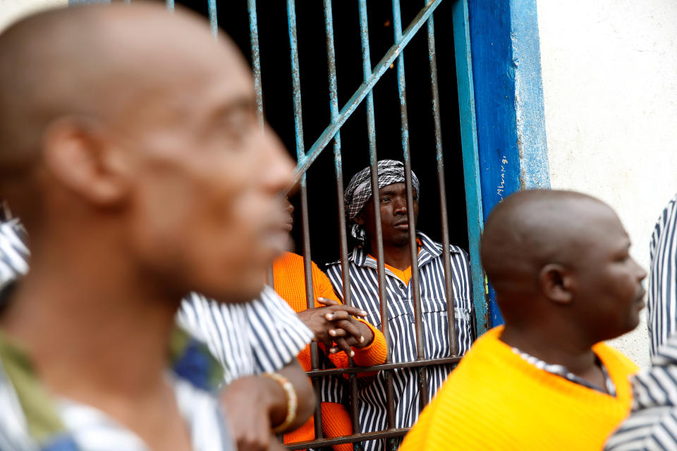 <p>Kenyan prisoners watch a mock World Cup soccer match at the Kamiti Maximum Security Prison, near Nairobi, on June 14, 2018. (Photo: Baz Ratner/Reuters) </p>