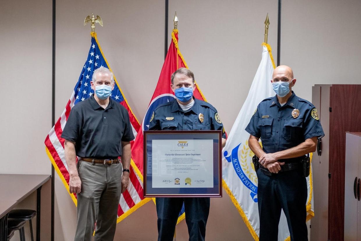 Mayor Joe Pitts, left, Clarksville Police Sgt. Charles Gil, the department's accreditation manager, and Police Chief David Crockarell gathered to celebrate the department's re-accreditation by the Commission on Accreditation for Law Enforcement Agencies in this file photo