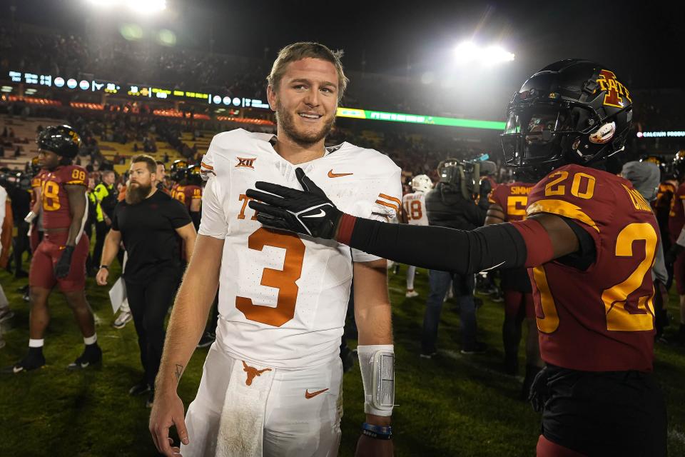 Texas quarterback Quinn Ewers walks off the field at Jack Trice Stadium in Ames, Iowa, after Texas' 26-16 victory in November.  Ewers' No. 3 jersey will be on the cover of EA Sports' upcoming College Football '25 video game.