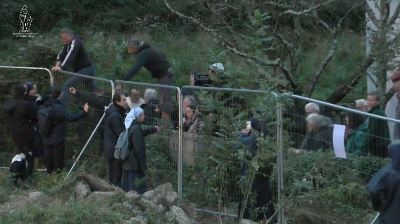 Members of the Missionary Family of Notre Dame attempted to block environmental activists from accessing the construction site.