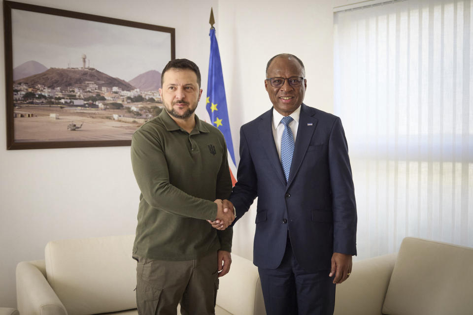 In this photo provided by the Ukrainian Presidential Press Office, Ukrainian President Volodymyr Zelenskyy, left, meets with Cape Verde's Prime Minister Ulisses Correia e Silva, in Cape Verde, Saturday, Dec. 9, 2023 while he travels to Argentina for the inauguration of the newly-elected President Javier Milei. (Ukrainian Presidential Press Office via AP)