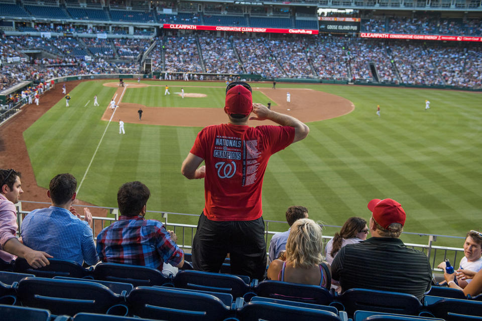 Fans watch the game