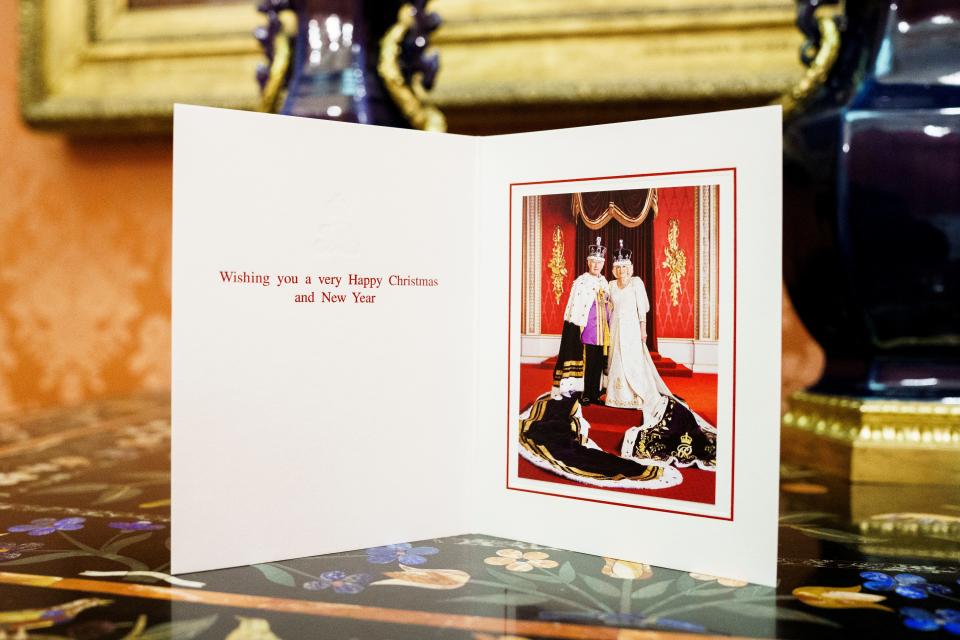 The 2023 Christmas card of King Charles III and the Queen Camilla. The photograph was taken in the Throne Room at Buckingham Palace in London, following their coronation on May 6, 2023.