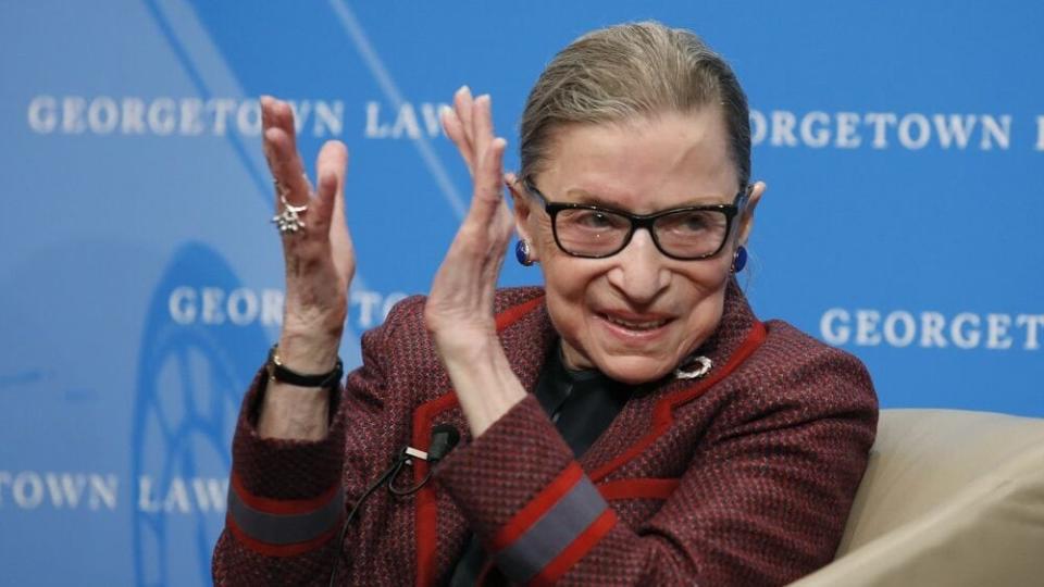 In this April 6, 2018, file photo, Supreme Court Justice Ruth Bader Ginsburg applauds after a performance in her honor after she spoke about her life and work during a discussion at Georgetown Law School in Washington. (AP Photo/Alex Brandon, File)