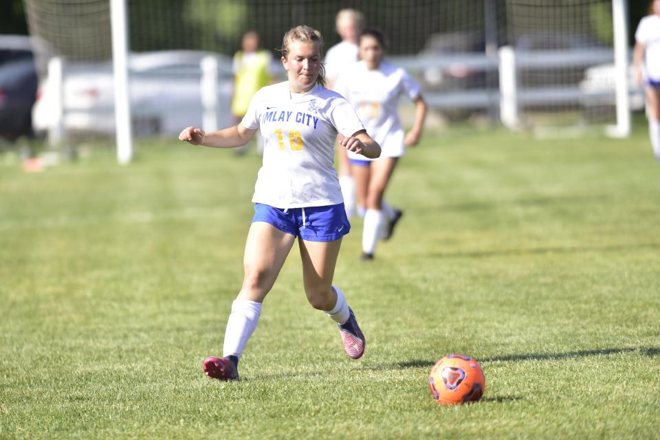 Imlay City's Wren Dennis goes after the ball during a game last season.