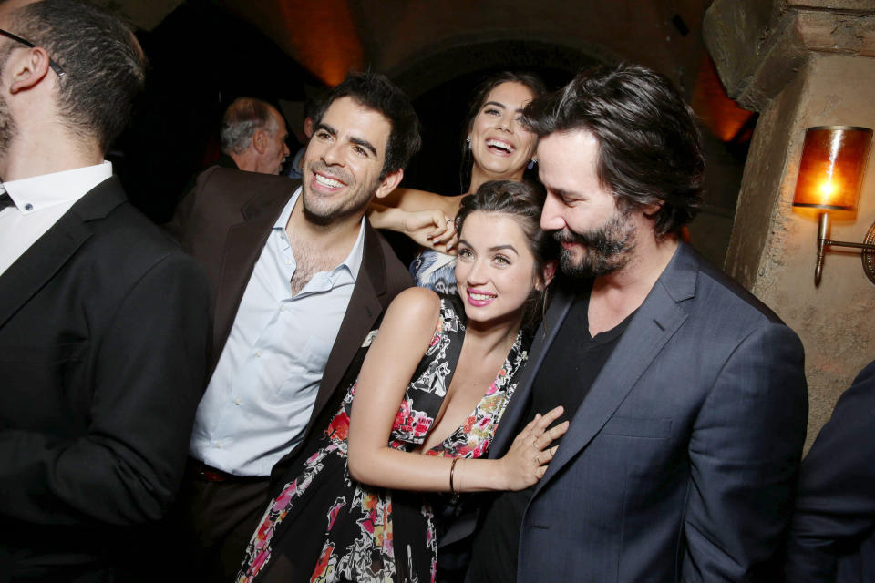 Director/Writer/Producer Eli Roth, Lorenza Izzo, Ana de Armas and Keanu Reeves seen at the Lionsgate Premiere presents the Los Angeles Special Screening of 'Knock Knock' at TCL Chinese 6 on Wednesday, Oct. 7, 2015 in Los Angeles. (Photo by Eric Charbonneau/Invision for Lionsgate Premiere/AP Images)