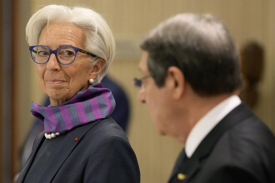 President of the European Central Bank Christine Lagarde looks the Cyprus President Nicos Anastasiades during a press conference after their meeting at the Presidential Palace in the capital Nicosia, Cyprus, Wednesday, March 30, 2022. Lagarde is visiting European Union member Cyprus amid the country's continuing efforts to buttress its banking system following a 2013 financial crisis that nearly brought the island nation to bankruptcy. (AP Photo/Petros Karadjias)