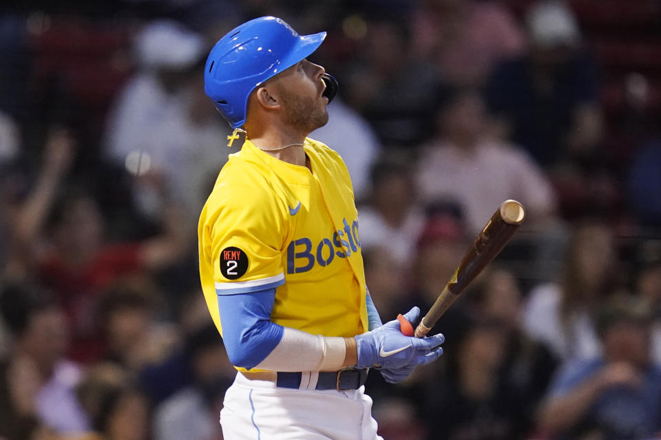 Boston Red Sox's Trevor Story watches the flight of his three run home run ball off Detroit Tigers starting pitcher Beau Brieske during the fourth inning of a baseball game, Tuesday, June 21, 2022, at Fenway Park in Boston. (AP Photo/Charles Krupa)