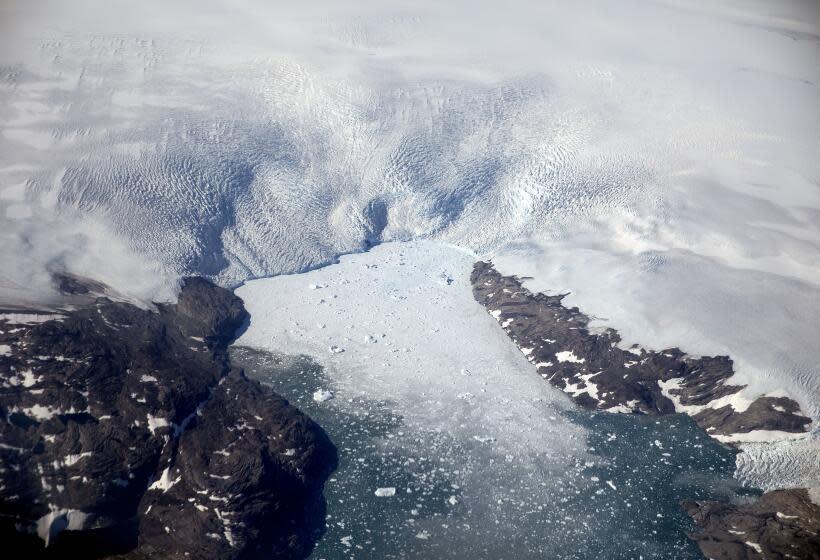 FILE - In this Aug. 3, 2017, file photo a glacier calves icebergs into a fjord off the Greenland ice sheet in southeastern Greenland. The Biden administration is stepping up its work to figure about what to do about the thawing Arctic, which is warming three times faster than the rest of the world. The White House said Friday, Sept. 24, 2021, that it is reactivating the Arctic Executive Steering Committee, which coordinates domestic regulations and works with other Arctic nations. It also is adding six new members to the U.S. Arctic Research Commission, including two indigenous Alaskans. (AP Photo/David Goldman, File)