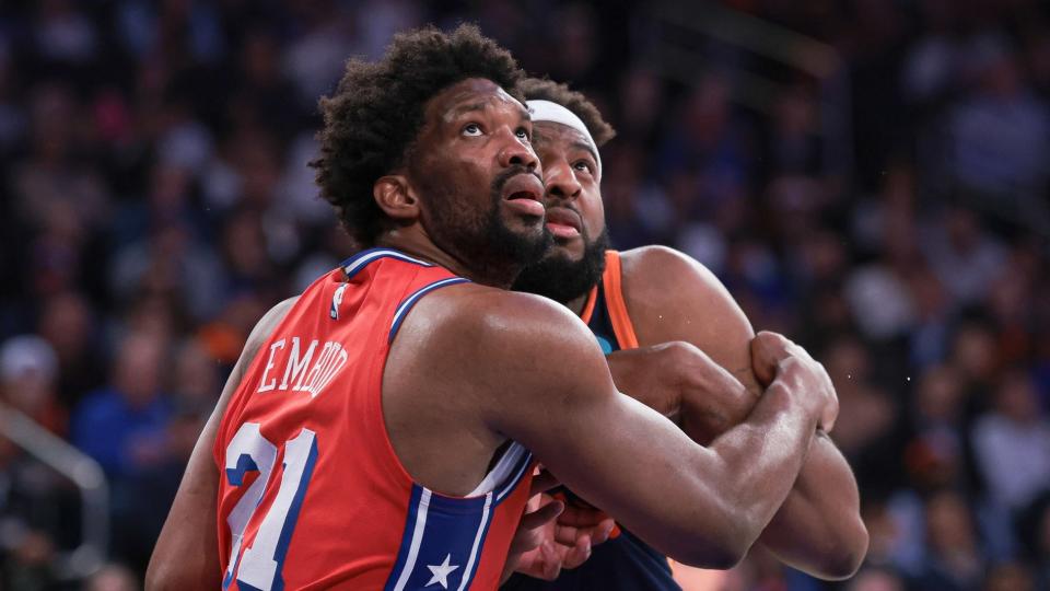 Philadelphia 76ers center Joel Embiid (21) battles for position against New York Knicks center Mitchell Robinson (23) during the second half during game two of the first round for the 2024 NBA playoffs at Madison Square Garden.