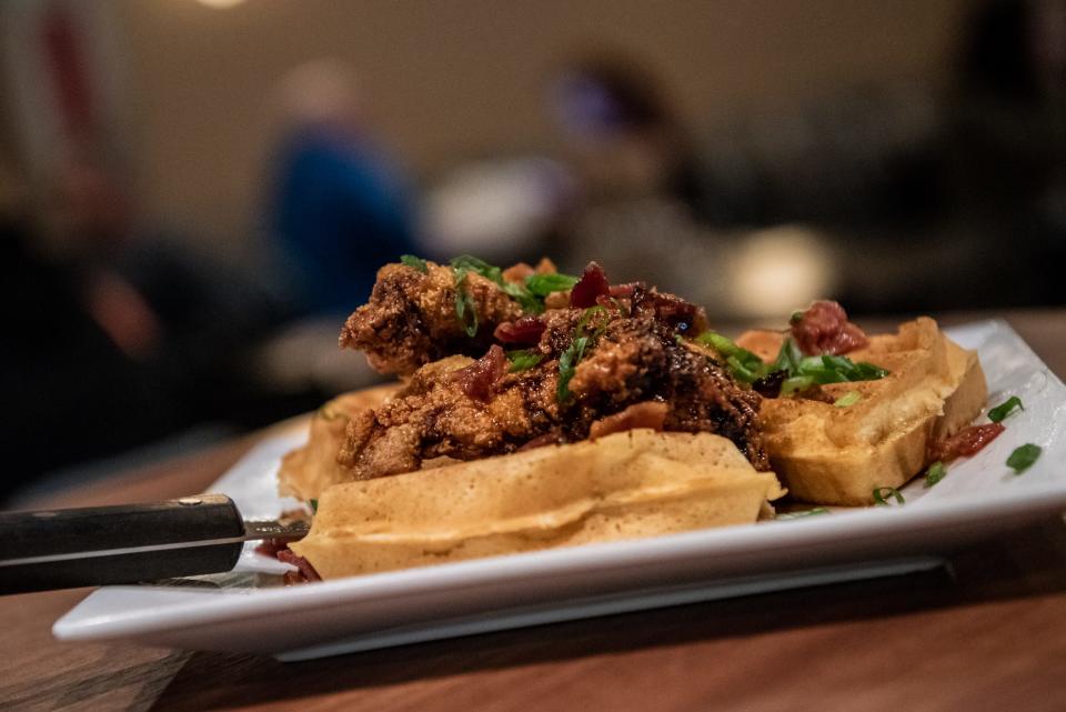 A feature item on the menu at Embers Smokehouse and Tap, in Chalfont, is "Our Chicken and Waffles," southern fried boneless chicken thighs served over a buttermilk Belgian waffle and topped with smoked bacon maple syrup.