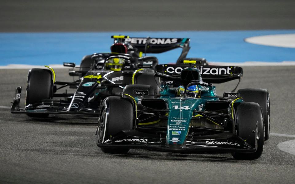 Mercedes driver Lewis Hamilton of Britain and Aston Martin driver Fernando Alonso of Spain, front in action during the Formula One Bahrain Grand Prix at Sakhir circuit, Sunday, March 5, 2023 - AP Photo/Frank Augstein