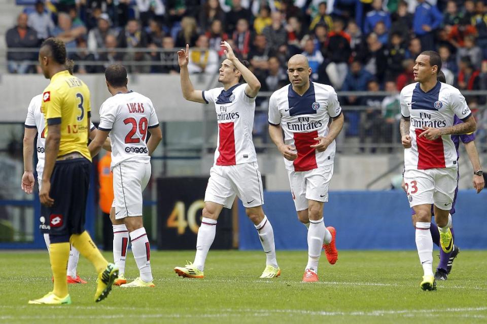 Paris Saint Germain's Edinson Roberto Cavani, center, celebrates after he scored a goal against Sochaux during their French League One soccer match in Sochaux, eastern France, Sunday, April 27, 2014. (AP Photo/Laurent Cipriani)