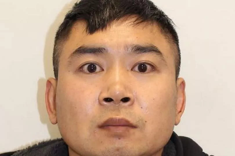 Tianfu Guo police mugshot