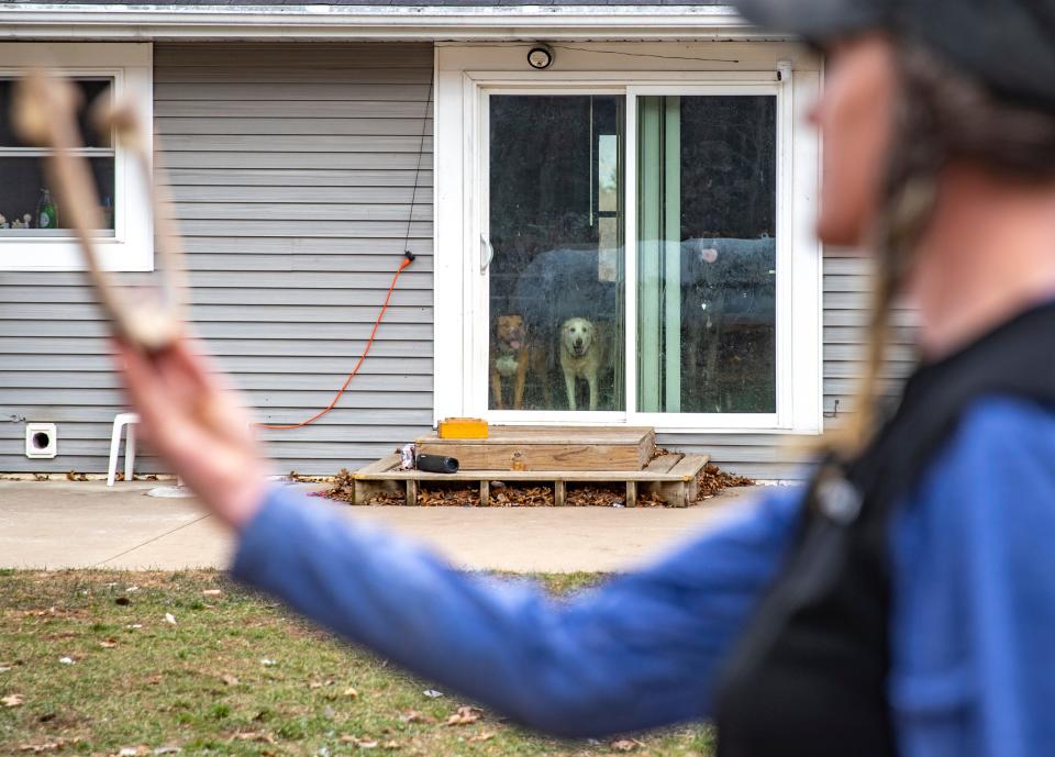 Paula Schwerdtfeger, 47, practices her passion of horseshoe throwing at her home in Waupaca, Wisconsin on Tuesday, April 9, 2024. Gabi Broekema/USA TODAY NETWORK- Wisconsin