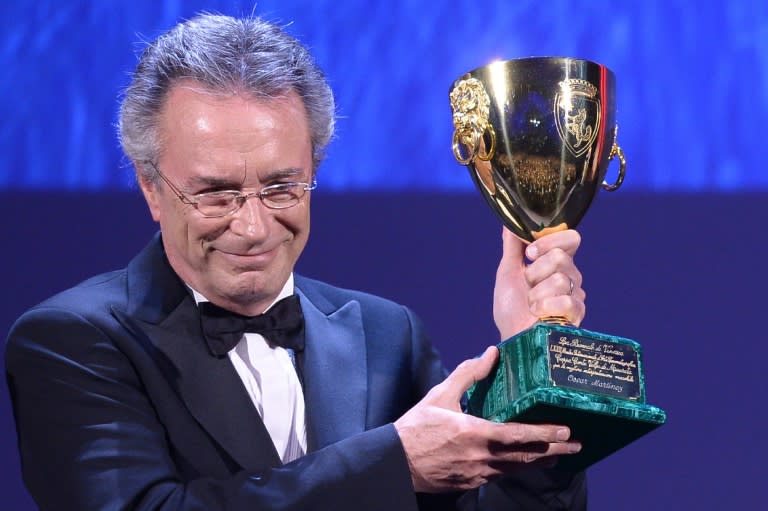 Actor Oscar Martinez holds the Volpi Cup award for Best Actor in the film "The Distinguished Citizen" (El Ciudadano Ilustre) during the awards ceremony of the 73rd Venice Film Festival on September 10, 2016 at Venice Lido