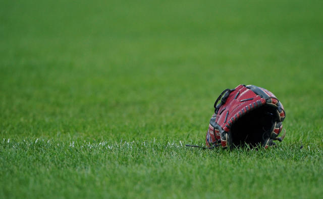 Kansas college baseball team says foreign substance added to water cooler  at game, prompts police probe