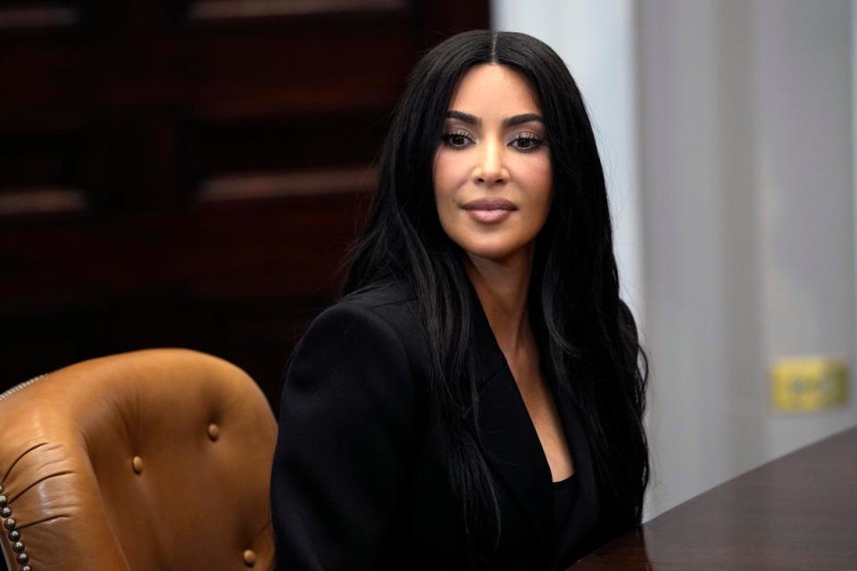 Kim Kardashian listens during a discussion in the Roosevelt Room of the White House in Washington, Thursday, April 25, 2024 (AP)