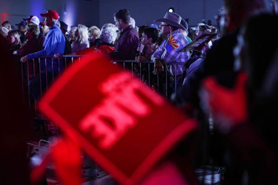 Supporters of Arizona GOP gubernatorial candidate Kari Lake wait for her to make an appearance